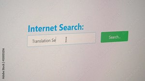 Internet search for Translation Services, computer screen shot close up as user types in translator key phrase, so pixel grid is visible, actual footage, not rendered animation.