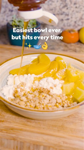 Dole Packaged Foods on Instagram: "POV: You’ve got 3 minutes 🍍🥣 Recipe here: ½ cup cottage cheese Dole Sliced Peaches Dole Tropical Gold Pineapple Chunks Granola for topping 1 tablespoon honey"