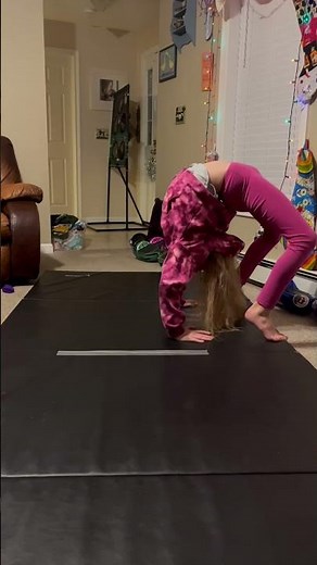 Gymnastics contortionist feet to hand