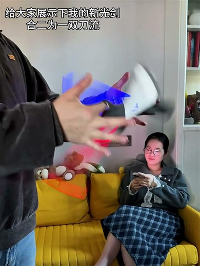 Let me show you my new lightsaber. It can be combined into a dual-blade style