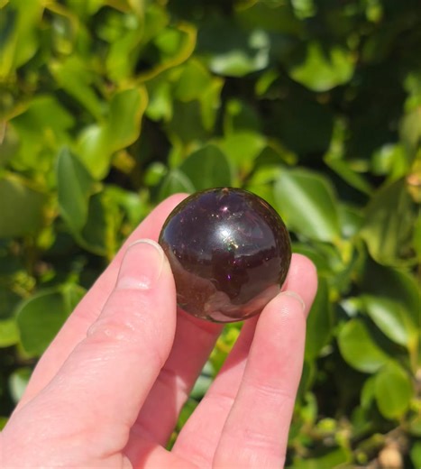 Beautiful Smokey Quartz Sphere $24 and 3.3cm in diameter Smoky quartz's spiritual meaning centers on grounding, protection, and the release of negativity. It's a "grounding stone" that helps connect individuals to the present moment and the stability of the Earth. Spiritually, it's used to absorb and transmute negative energies, provide a shield against harmful influences, and promote inner strength and clarity, often associated with the Root Chakra. | Shevron Crystals