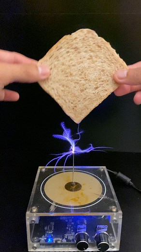 21K views · 71 reactions | Tesla Coil VS Bread  #Science #satisfying #teslacoil #fblifestyle | Kadek Tesla Coil Experiment | Facebook