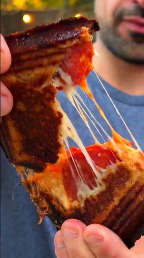 These crispy, cheesy pie-iron pizza sandwiches taste like summer around the bonfire 🍕