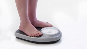 Fat Man on Scale