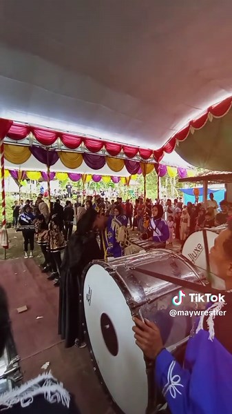 Slow Motion Drum Band Performance with Creative Money Tossing