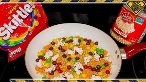 We tried making colored popcorn from Skittles