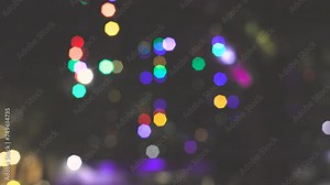 Bokeh from blinking colored lights creates interesting digital pattern
