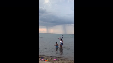 Visible waterspouts form over Lake Michigan in Chicago, Illinois, USA