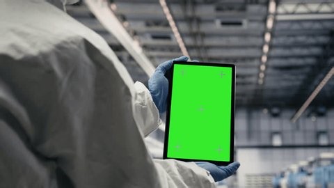 clip-4044240533-isolated-screen-tablet-used-by-microchip-factory