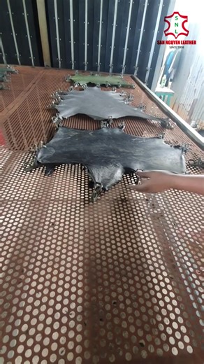 Removing wrinkles, and preventing it from shrinking or curling as it dries. | San Nguyen Leather