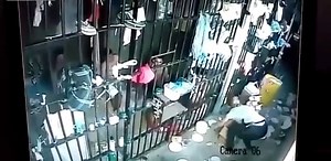Female Security Guard Gets Her Head Yanked By Prisoner!