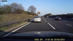 Dad pulls over on inside lane of motorway to let son pee