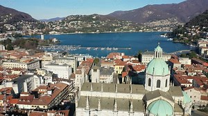The Cathedral of Como. Aerial view with drone over the city. Tourist destination on lake of Como in Italy.