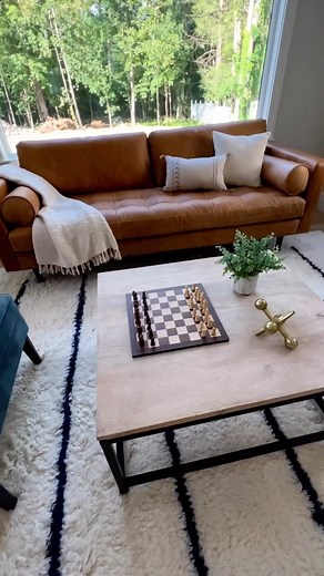 3.2K views | The Napa Sofa in Cognac Tan is bringing Fall tones to this beautiful open-plan living area. Designed by @fp_homestaging  Follow us for more home interior inspo! #polyandbark #livingroom #livingroominspo #colourscheme #sofa #tansofa #leathersofa #livingroomdecor #falldecor | Poly & Bark | Facebook
