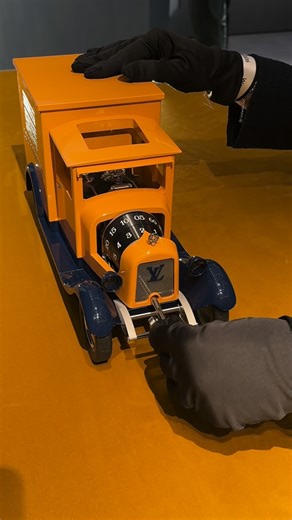WATCH INSANITY on Instagram: "A delivery van once used to carry trunks becomes a mechanical timekeeper. At LVMH Watch Week 2026 in Milan, @louisvuitton transforms a symbol of its origins into a collectible object of High Horology. This is Camionnette, a table clock inspired by the historic delivery van that, in the early 20th century, connected the Asnières workshops with the Maison’s clients and boutiques. Crafted in lightweight aluminium and finished in the iconic saffron yellow and sibylline 