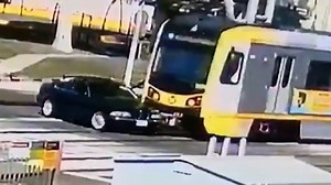 Train crushes car when driver tries to cross track