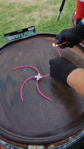 Fuse ConneX are a game changer for putting your show together. These X-shaped clamps tie multiple fuses so fire passes through cleanly without the hassle of zip ties or tape. Light one main fuse, sit back, and enjoy the show. 🎆 WHY YOU'LL LIKE THEM: 🔥 They transfer fire through a network of fuses reliably. 🔥 Easy to use for home or commercial displays. 🔥 Built for safety and consistency when used responsibly. 🔥 100% Made in USA. QUICK HOW-TO (ALWAYS KEEP IT SAFE): 1️⃣ Lay out fireworks on l