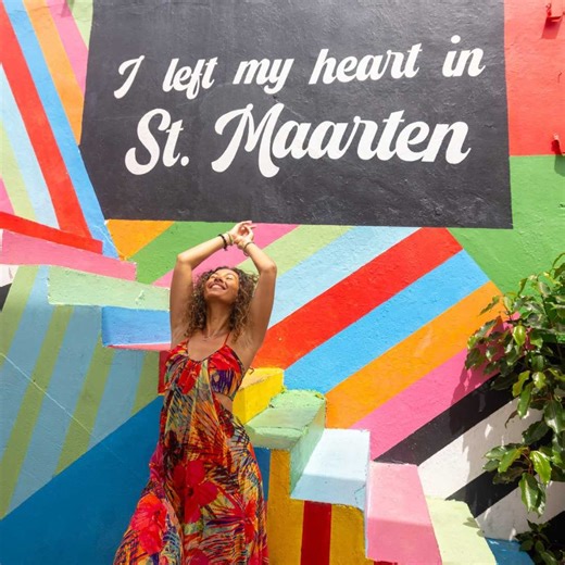 8.9K views · 37 reactions | Let your spirit dance to the vibrant rhythms of St. Maarten.  St. Maarten offers so much more than a tropical escape. It’s a vibrant canvas painted with culture, color, and art—an immersive tapestry that mirrors the heart and soul of its people. Whether you’re wandering through the charming streets of Philipsburg or indulging in the best seafood through beach-bar hopping, pause to soak in the island’s incredible energy. | Vacation St. Maarten | Facebook