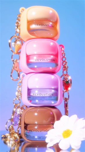 Revolution Makeup on Instagram: "POP, CLICK… COLLECT ‘EM ALL! 💖✨ Meet the Totally Charmed collection, playful pocket-sized pigments, pop-socket Powder Pops, and lip treats you’ll want on repeat 💅💋 Which product are you collecting first? 🛍️ 📸: @eveemax #TotallyCharmed #newlaunch #PowderPops #OnTheGoGlam #y2k #revolutionbeauty #crueltyfree"