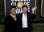 Suited up! Susan Sarandon arrives at 2018 Golden Globe Awards