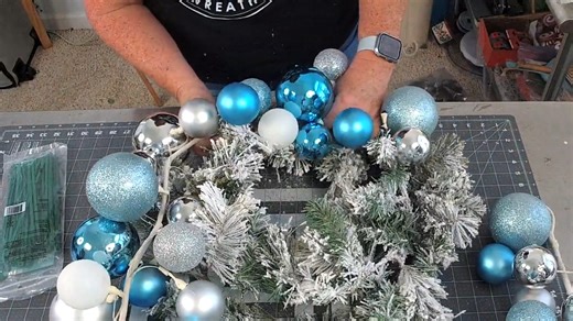 Ready to add a little sparkle to your holiday decor? In this video, Coach Laurie Anne is showing you step-by-step how to make a beautiful ornament wreath that’s full of charm and festive flair! It’s easier than it looks, and the end result is pure Christmas magic. ✨ Grab your greenery, picks and your favorite ornaments, and let’s get crafting! | Southern Charm Wreaths