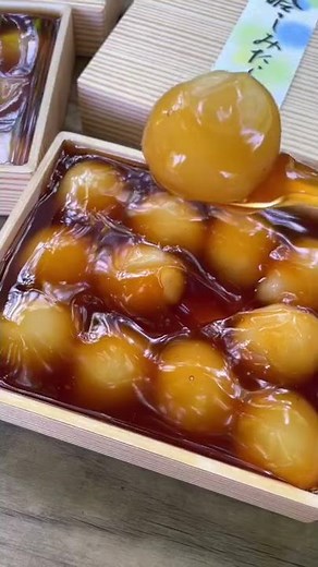 Cold mitarashi dumplings from a Japanese sweets shop