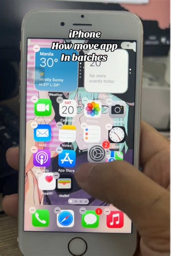 How to move apps in batches on an iPhone \t1.\tLong-press on the Home Screen to enter edit mode. \t2.\tLong-press and drag one app, and do not release it. \t3.\tWhile holding it, tap the other apps you want to move together. When you see a number appear on the app icon, it means the apps are grouped and can be moved together. This saves you from moving apps one by one #iphone #iphonetricks #iphonetutorial #iphonetips #fyp