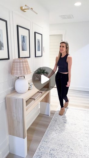 Lauren Jansen | DIY on Instagram: "DIY Console Table Build! And it was so simple too! I cut down 1x10 poplar boards - two legs at 34” and the top at 48”. I assembled them with wood glue and finish nails, then added a shelf 7” from the top. I glued and nailed that in as well. I trimmed it all out with 1x3 poplar (with mitered corners) so it looked a little nicer and sturdier. Then I mixed sawdust with wood glue to form a wood filler to fill all the nail holes and seams before sanding it all down.