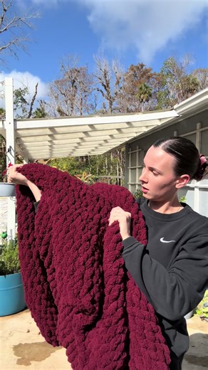I used 8 skeins🧶 of the Mello Bello yarn in Wine Red. This yarn was so beautiful and soft. The process of making the blanket is relaxing, fun and makes a perfect gift for loved ones! You could make a small throw blanket or one big enough to cover your bed. Click the link to see the options🤩‼️ #mellobello #chunkyknitblanket #ideas #crotchet #knitting