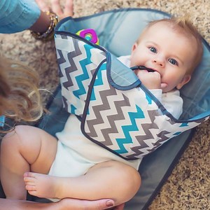 205K views · 971 reactions | Make changing diapers less of a wrestling match. | Fatherly | Facebook