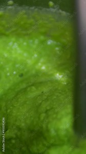 A plate of soup puree of green peas with mint on a table. Puree mashed potatoes with green pea in bowl on wooden table