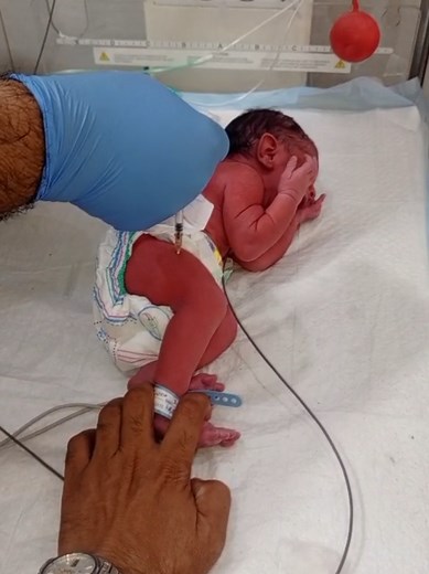 Newborn's First Vaccine: A Touching Nursery Moment