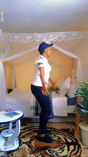 Dance Moves in a Cozy Bedroom Setting