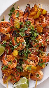 Recipe: https://www.wellplated.com/coconut-pineapple-shrimp-skewers/ Nothing says summer like Coconut Pineapple Shrimp Kabobs! 🍤🍍🥥 This yummy shrimp marinade only has FIVE ingredients! | Well Plated