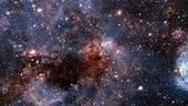 Seamless loop galaxy exploration through outer space towards glowing...