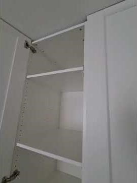 A customized IKEA Pax wardrobe, designed to maximize space.
