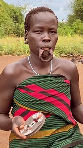 The Mursi people of Ethiopia are renowned for their distinctive cultural practice of wearing traditional lip plates, a symbol of beauty and identity. #culturaldiversity #africanculture #reelsfbシ #reelsviralシ #Ethiopia #africa | Djm Live