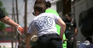 Denver police volunteer with other agencies to serve a crime-ridden southwest Denver community