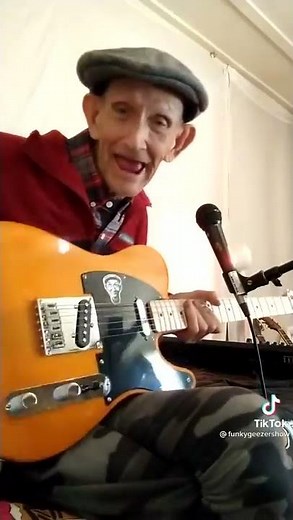 Funky Geezer wait till he sings with his new guitar