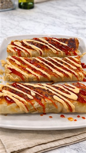 Cooking crunchy vegan rolls with flaky phyllo sheets