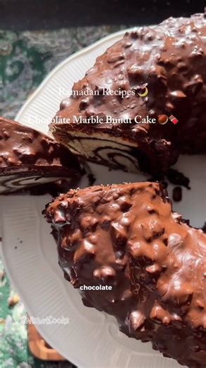 Nishat Cooks on Instagram: "Vanilla & Choc Hazelnut Bundt Cake! 🍫🌰 Thank you @russellhobbsuk for the standing mixer! 🤍🤎 Ingredients Sponge Base: 150g Butter (room temp) 150g Yoghurt / Sour Cream / Buttermilk 100ml Veg Oil 400g Caster Sugar 8 Medium Eggs 2-3tsp Vanilla Vanilla sponge: 200g Plain Flour 1tsp Baking Powder Chocolate sponge: 175g Plain Flour 1tsp Baking Powder 80g Cocoa Powder 2tbsp Coffee Pinch of Sea Salt 10-15ml Warm water 300g Dark Chocolate 150g Milk Chocolate 2tbsp Coconut