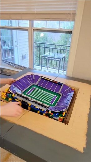Lifting the lower bowl in and out of my Lego U.S. Bank Stadium build