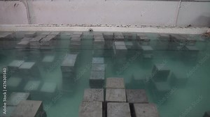 Water Absorption Test of Bricks, determination of durability property of bricks such as degree of burning, quality and behavior of bricks in weathering, soaking bricks in the water dolly in shot