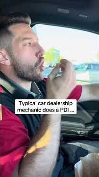 Typical car dealership mechanic does a PDI …