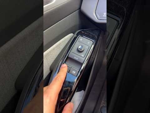 Weirdest car window switch. 3 buttons!