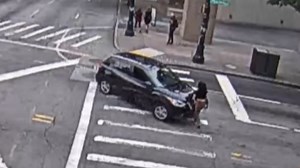 Video shows alleged hit-and-run driver move victim to sidewalk before leaving scene