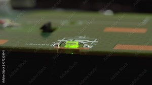 The green SMD led lights up and blinks on the Board. The loading of the data. enabling or disabling an action.