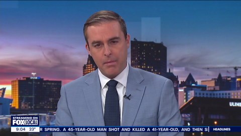 Cars piled up against Milwaukee freeway retaining wall