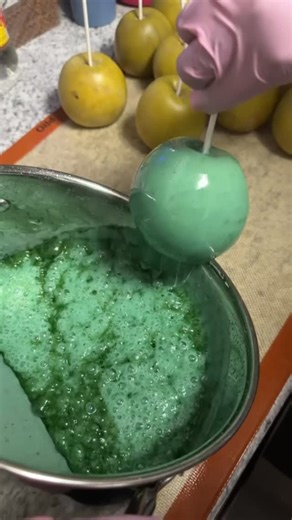 Shay & Toya on Instagram: "Hatching Soon 🦖🥚 Behind the scenes of me making Hatching Soon dinosaur candy apples 🥚🦖💚 Sweet details, custom designs, and prehistoric perfection ✨ #SweetHarmonyBakery #HatchingSoon #DinoTheme #BehindTheScenes #CandyAppleLove"