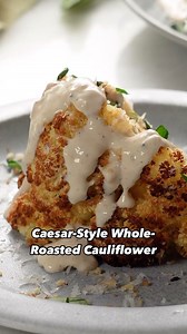 EatingWell on Instagram: "Roasting cauliflower whole makes for a seriously impressive veggie main dish. @amandaeight drew flavor inspiration from Caesar salad by making a creamy dressing to accompany the crispy, tender cauliflower. Ingredients - 1 medium head cauliflower - 3 tablespoons extra-virgin olive oil, divided - 1/8 teaspoon salt - 3/4 teaspoon ground pepper, divided - Cooking spray - 1 cup whole-milk plain strained (Greek-style) yogurt - 4 tablespoons grated Parmesan cheese, divided - 2